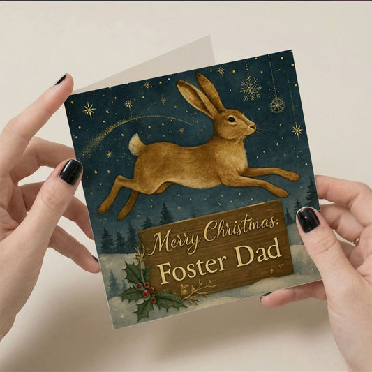 6x6" Greetings Card - Golden hare leaping under starry teal sky with gold snowflakes and festive text